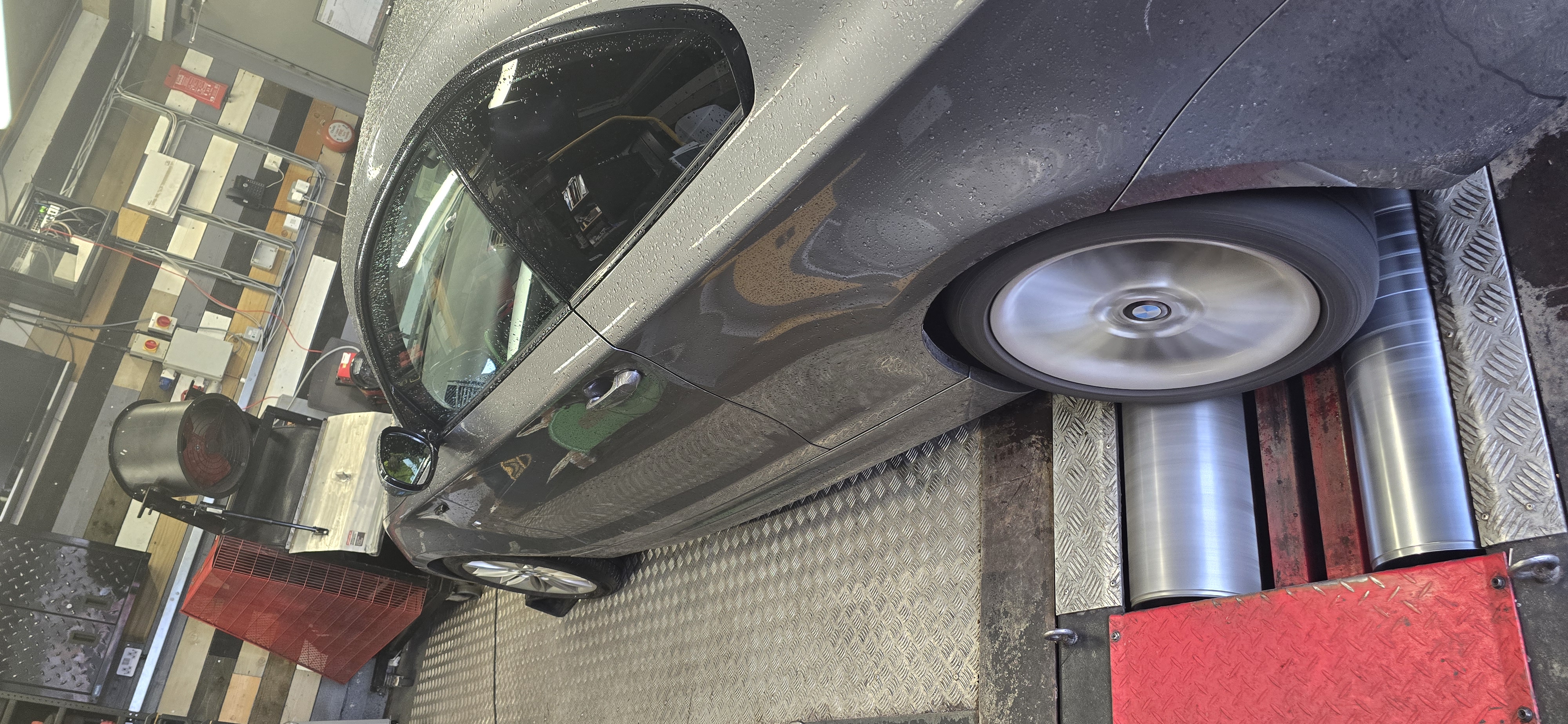 Vehicle under load during rolling road dyno testing
